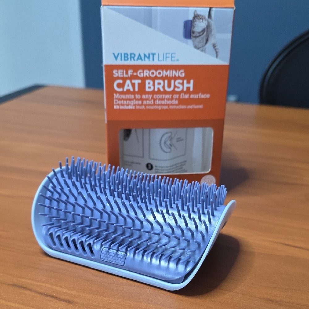 Vibrant Self-Grooming Cat Brush in Purple